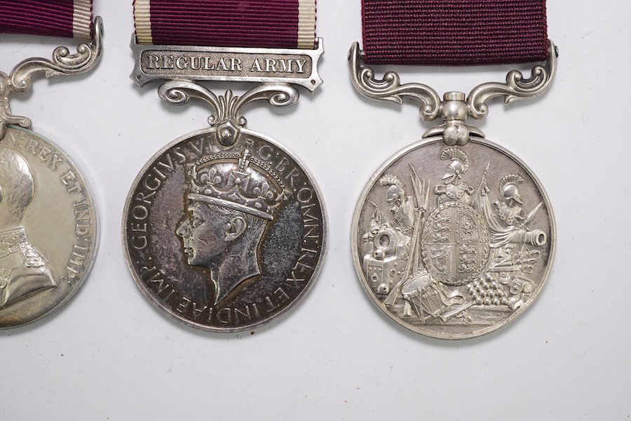 Four Army Long Service and Good Conduct medals; Vict to 21579 Gunr A.Milln. R.A.; GV to 1404425 B.Q.M.Sjt. W.A.Price R.A.; GVI Regular Army to 1057526 Sjt.T.Jones. R.A.; ERII Regular Army to 21133135 Sgt.Khagesor Thapa 2